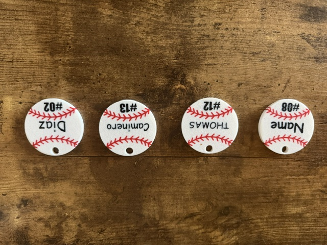 Custom baseball keychains with player names and numbers